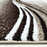 Enigma New / 307-76 Brown-beige - detail povrchu a obšití z boku
